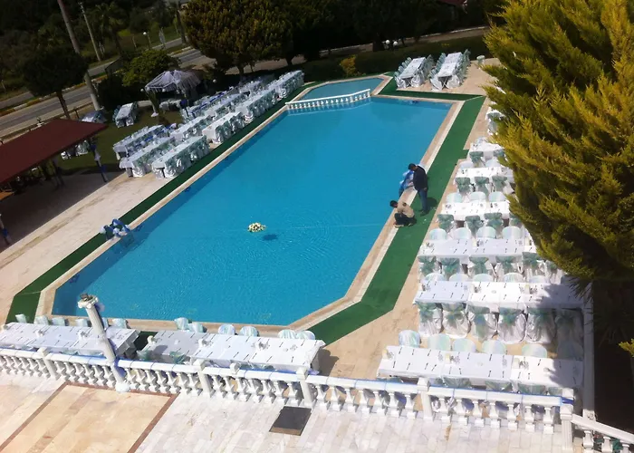 The Palm Club Hotel *